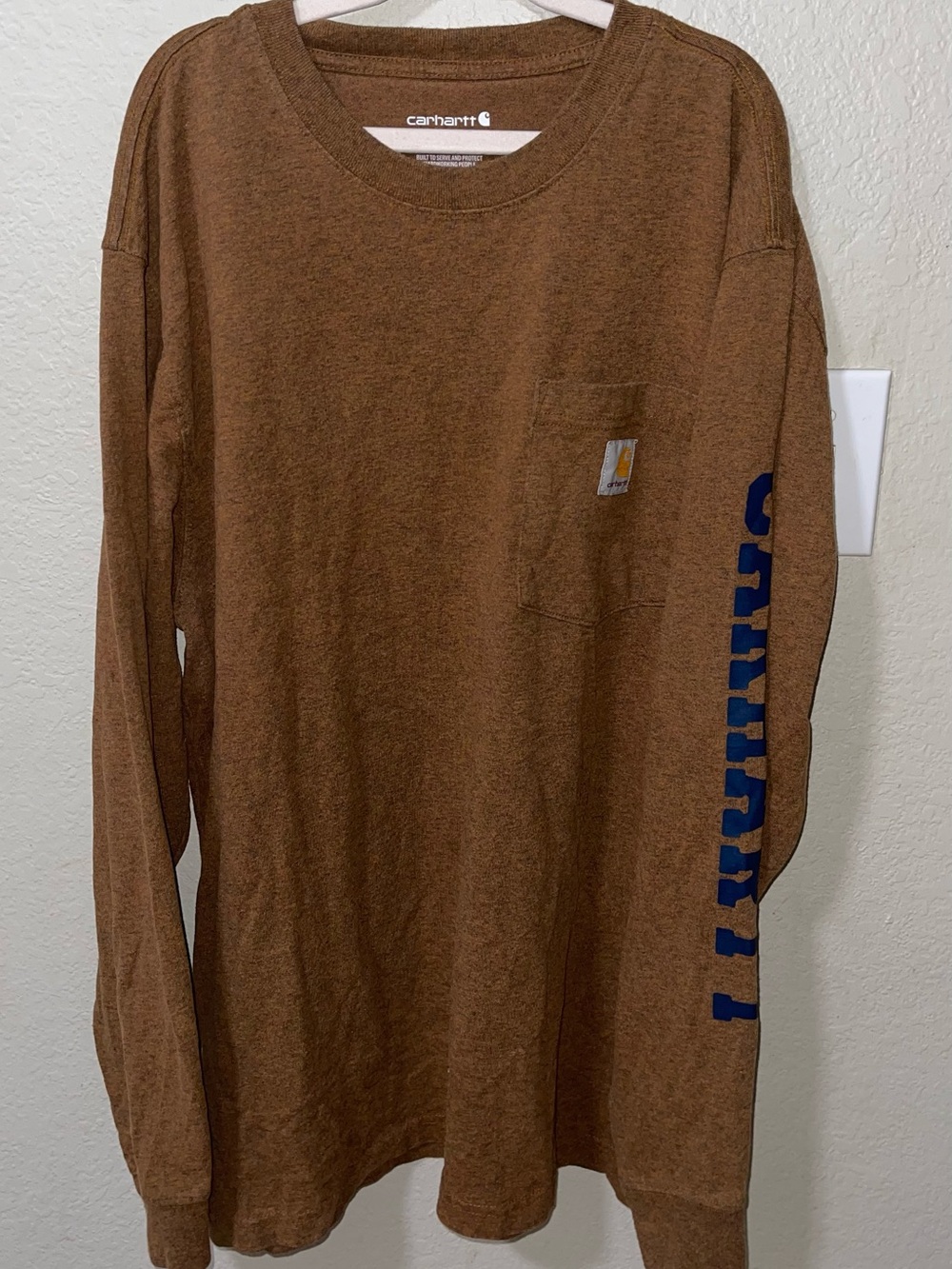 Carhartt Brown Long-Sleeve Pocket Tee with Blue Sleeve Logo